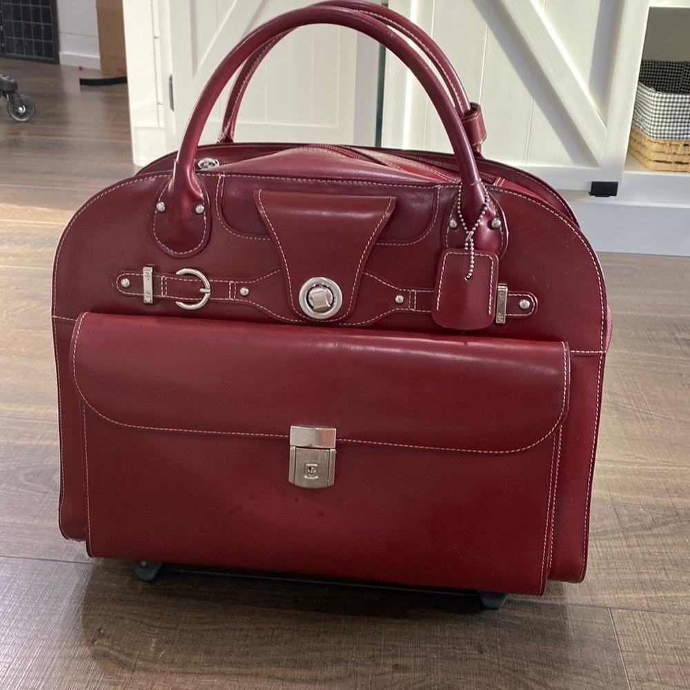 Genuine Leather Red rolling satchel -used